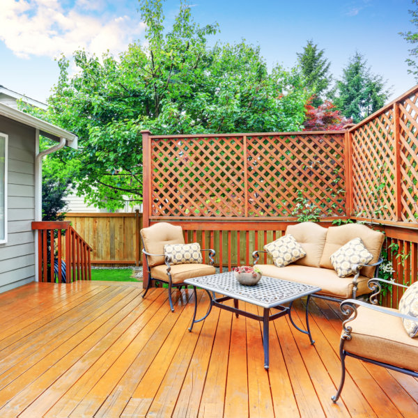Spacious wooden deck with patio area and attached pergola. Northwest, USA